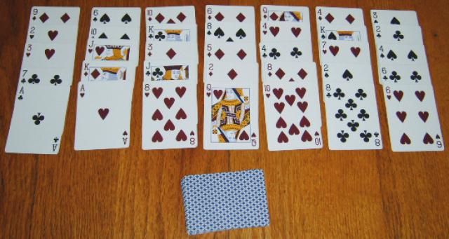 Playing solitaire cards